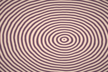 Naklejka premium Hypnotic concentric circles pattern in soft lavender and cream tones for modern aesthetic interior wallpaper