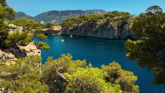 Calanques, also known as French fjords, winding bays with turquoise water among high cliffs. Provence, Alps, Cote dAzur, Marseille district, France. High quality 4k footage