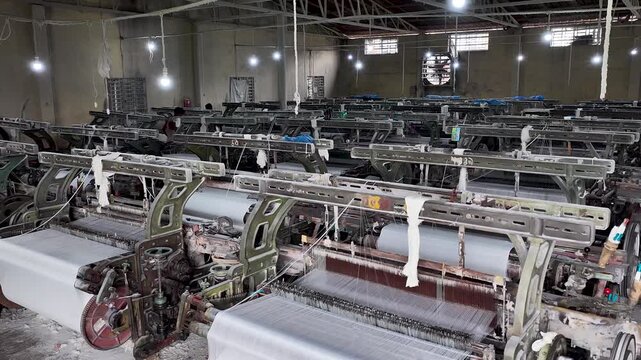 Interior Of Textile Mill With Weaving Machines