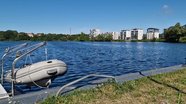 Inflatable dinghy on boat davits at Ziegelinnensee in Schwerin, Germany