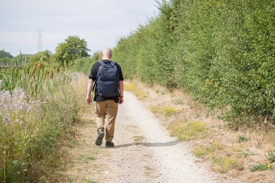 Person walking in the countryside on a summers day 