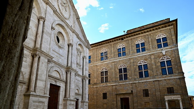 Renaissance facade of Pienza Cathedral and historic palace in Piazza Pio II Pienza Tuscany Italy for architectural history website