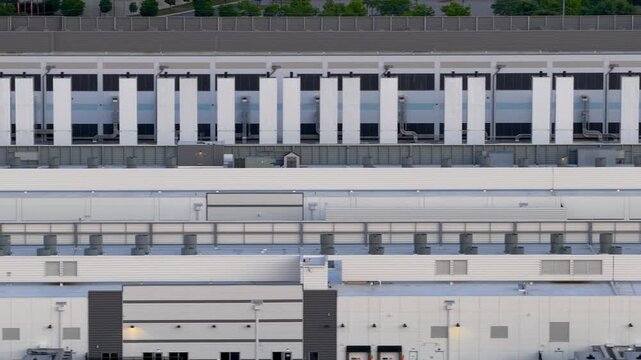 Aerial perspective of a large Data center with power generators and HVAC units