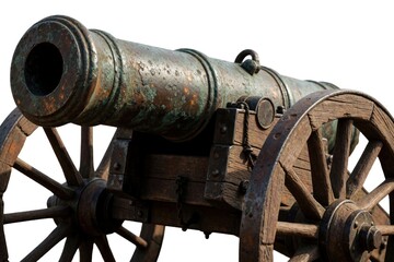 Fototapeta premium Weathered bronze cannon on wooden wheels rests on white background. Ancient artillery shows rust, patina. This vintage weapon represents historical warfare and defense.