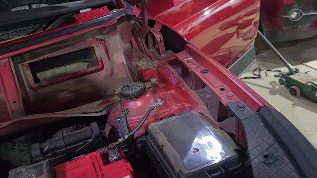 Professional Technician Installing New Front Windshield on Car in Automotive Workshop, Auto Glass Replacement and Repair