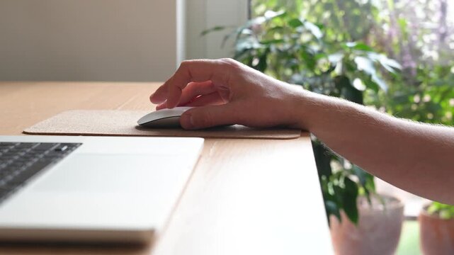 Person with incorrect hand position working on computer using mouse man with carpal tunnel syndrome, male massaging sore arm, dropping wrist at work causing pain, fingers tingling, joint inflammation.