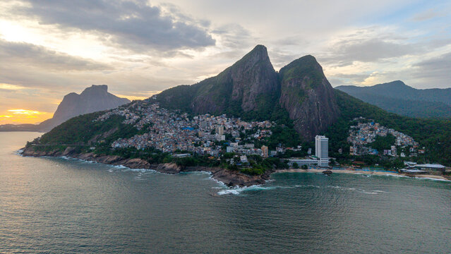 Aerial view of Vidigal favela nestled on the slopes of the Two Brothers mountain overlooking the Atlantic Ocean in Rio de Janeiro, Rio de Janeiro, Brazil.