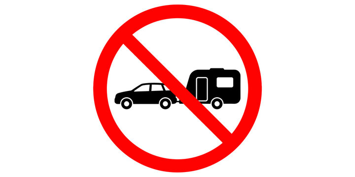 Prohibited towing vehicle sign with red circle and black trailer icon for road safety regulations.