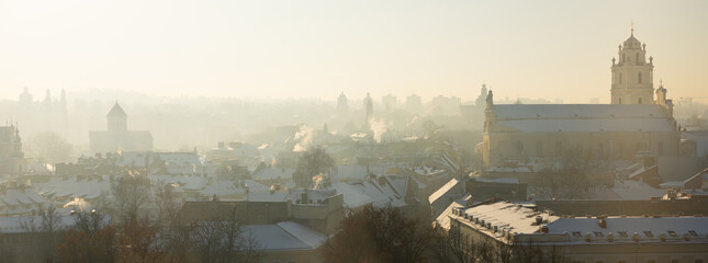 Fototapeta premium View from Palace of Grand Dukes of foggy Vilnius, capital of Lithuania
