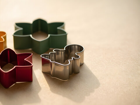 Separate generic winter-shaped metal cookie cutters without lettering for autumn retail, ecommerce and holiday-preparation campaign
