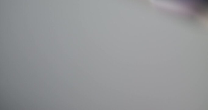 Tabletop Macro Close up of kitchen knife chopping onions in slow motion