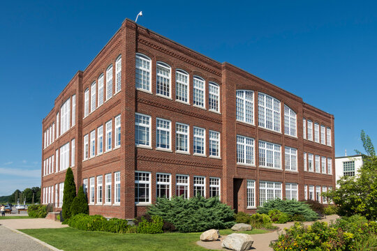 Irvington, NY - US - Aug 15, 2026 One Bridge Street, the former Lord and Burnham factory site in Irvington, New York, showcases historic brick architecture, large windows, and landscaped grounds today