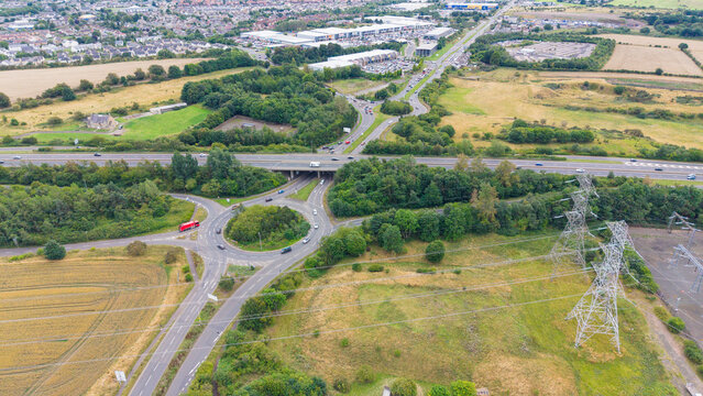 Aerial view of Straiton Junction roundabout and highway traffic near Edinburgh, Scotland