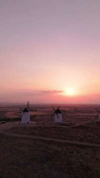 Aerial view of don quixote windmills at sunset in spain