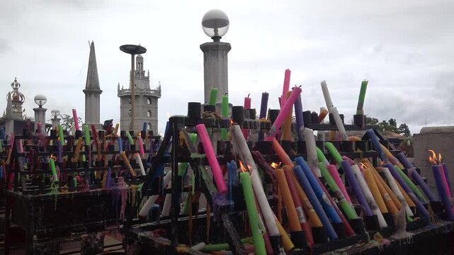 Simala Shrine - Burning Colourful Pray Candles - Catholic Church and Monastery of Holy Eucharist in Sibonga Village - Cebu City Region - Philippines Landmarks - Rainy Day - LS MS 4K UHD