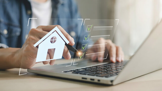 Person using stylus on tablet with house icon and checklist for real estate or property management