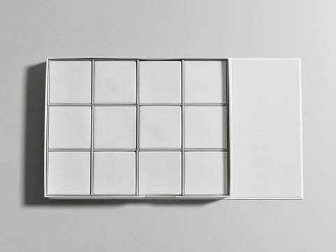 Open white rectangular box featuring twelve empty square compartments arranged in a grid, displayed on a plain white surface with soft shadows