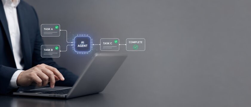 Futuristic holographic AI task automation interface above a laptop keyboard, task automation, intelligent automation, agentic ai for digital innovation