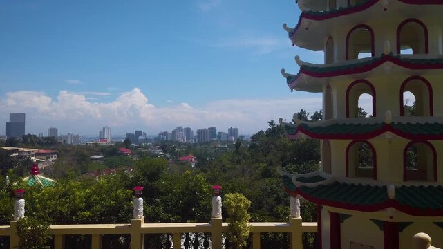Cebu Taoist Temple - Pagoda Tower and City Landscape Panorama - Philippino Chinese Community Shrine Complex -  MS LS 4K UHD