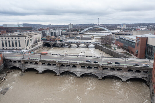 Aerial view of the Genesee River flowing under the historic Broad Street Bridge with the Frederick Douglass-Susan B. Anthony Memorial Bridge, Rochester, New York, United States.