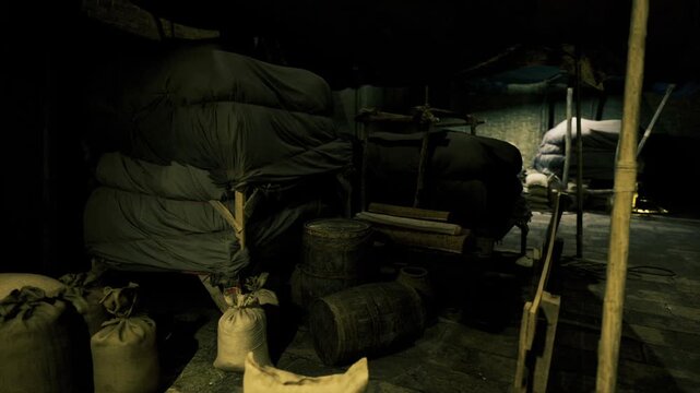 Dark underground cache covered sacks and woven bales under low ceiling, faint light creating dramatic silhouettes, atmosphere of hidden provisions