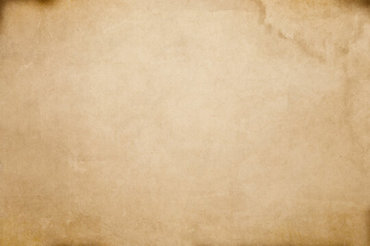 Aged grunge paper texture with stains for background design.
