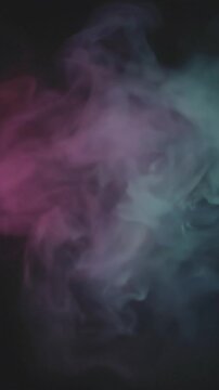 Colorful pink and teal smoke drifting horizontally against black background