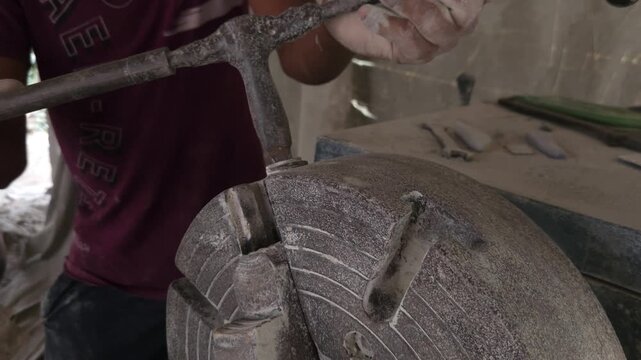 Traditional Artisan Making Granite Stone Utensil on Lathe Machine, Handcrafted Stone Bowl Manufacturing, Indian Stone Craftsmanship, Natural Granite Carving, Traditional Industry and Skilled Artisan