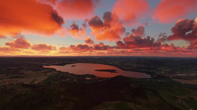 Circular aerial shot at sunset of Loch Leven lake in Kinross. Scotland. United Kingdom