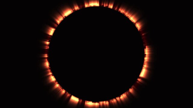 Ring of fire during solar eclipse with shimmering light flares and dark background
