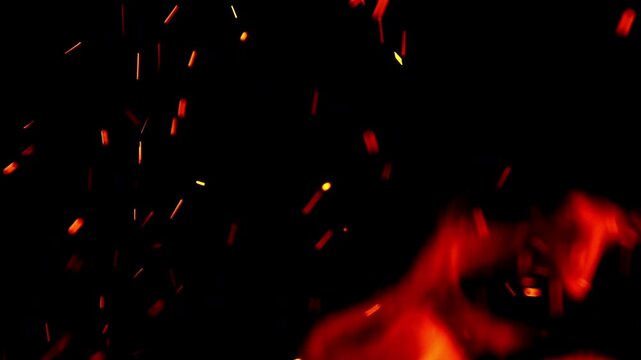 Fiery red spark particles rising from a burning flame overlay isolated on black background