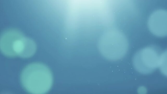 Blue background graphic sparkle abstract light bokeh soft glow and airy blur create calm design with glowing circle and soft airy space, blue gradient background sparkle abstract light bokeh graphic