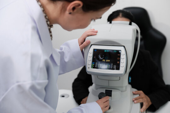 Close-up, refractometer device screen, patient eye exam, vision and eyesight improvement by expert optometrist, diagnostic for eyeglasses lens, professional technology services in optical clinic.
