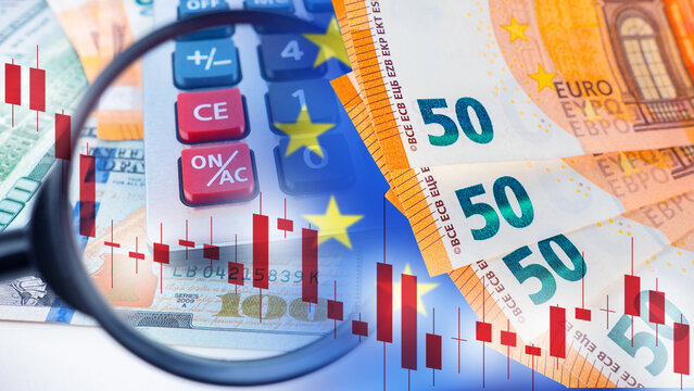 Financial analysis. Economist evaluates currency exchange trends and European market indicators using financial data for investment planning and risk assessment.
