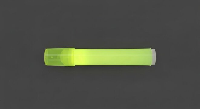 A bright neon yellow glow stick illuminated on a dark background