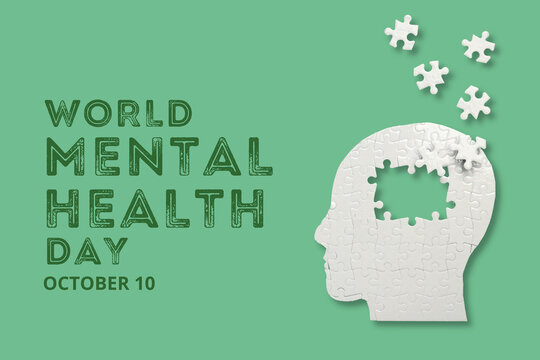 World Mental Health day. Puzzle pieces scatter around a head silhouette design