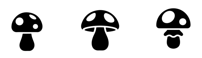 Fototapeta premium Minimalist mushroom icons set black vector silhouettes for nature branding forest maps and outdoor graphics.