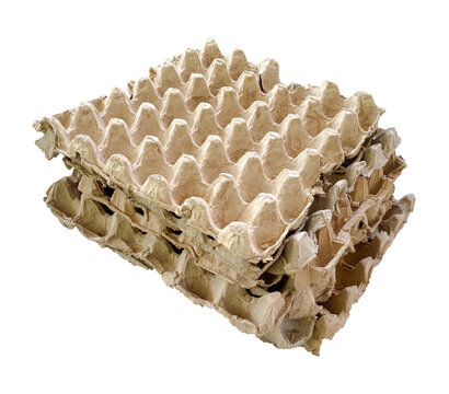 a pile of egg carton boxes separated on white