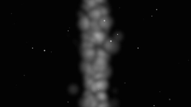 Abstract growing particles in dark space with soft glow representing development and growth