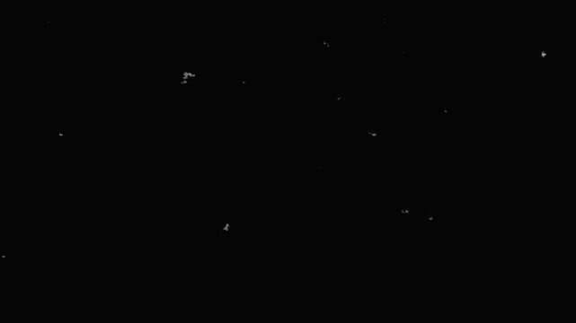 Tiny white particles drift slowly in dark void during cinematic night scene with subtle motion