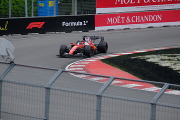 Fototapeta premium May 24, 2025, Montreal, Canada, Charles Leclerc drives Ferrari F1 car at Circuit Gilles Villeneuve. g.