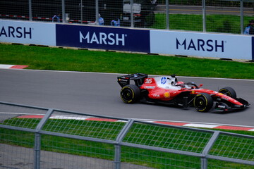 Fototapeta premium May 24, 2025, Montreal, Canada, Charles Leclerc drives Ferrari F1 car at Circuit Gilles Villeneuve. g.