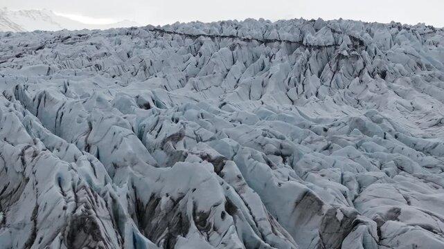 Ice formations at Hoffelsj&ouml;kull glacier in Iceland, slow aerial pan