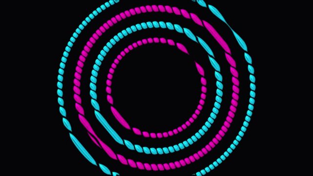 Abstract glowing particle rings spin in seamless loop against dark background motion graphic
