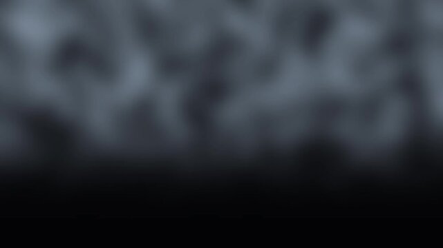 Wispy smoke particles drift across a dark background with subtle cinematic motion