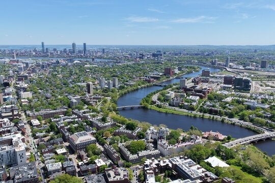 Aerial view of Cambridge and Harvard University with historic churches and Boston skyline, Massachusetts, USA. g.