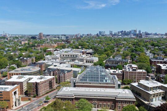 Aerial view of Cambridge and Harvard University with historic churches and Boston skyline, Massachusetts, USA. g.