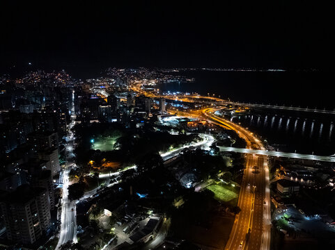 Florianopolis, Beira Mar Norte Avenue and Illuminated Cityscape at Night in Santa Catarina Brazil, Aerial View