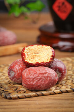Ruoqiang Dry Jujubes from Xinjiang China on Bamboo Mat Traditional Chinese Dried Fruit Red Dates
