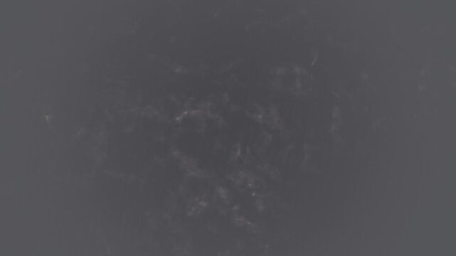Abstract smoke texture animation with floating fog and light beam overlay loop